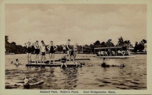 image of several young people on a dock at Waldorf Park, Robins Pond, East Bridgewater, Massachusetts circa 1950s or 1960s